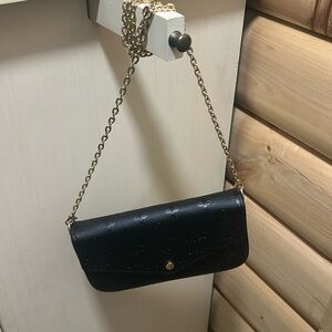 Black small “lv” clutch with chain